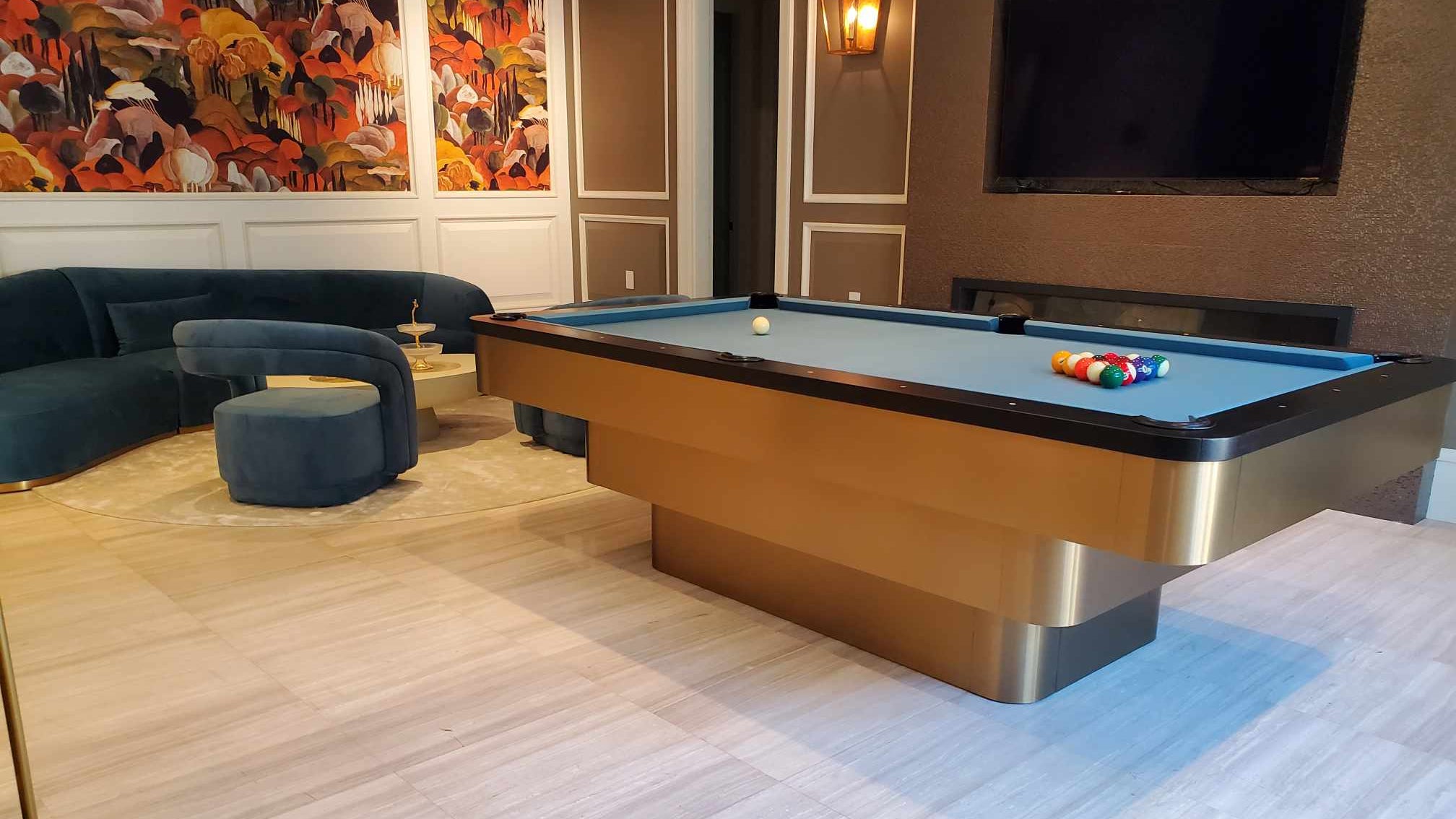 Billiards table with pool balls in a living room setting.1621243260e1af0c20-0