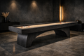 Wooden shuffleboard table in a dimly lit room with decorative elements.
