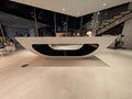 Modern white reception desk in a stylish interior setting